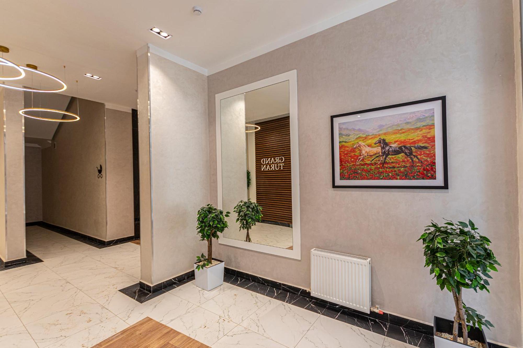 Raisson Aparthotel G84 Хан Шатыр Astana Ngoại thất bức ảnh
